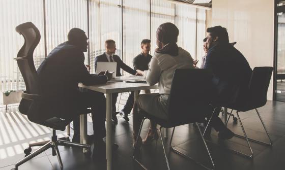 Business people around a boardroom table